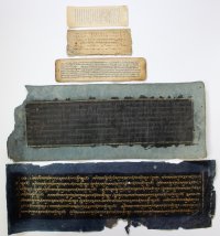 Lot of 5 leaves in Tibetan and Uighur scripts. Early to late19th Century.