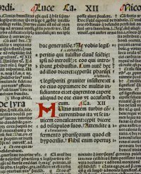 Glossed incunable leaf, 1498. Coloured initials added by hand. St. Luke Gospel.