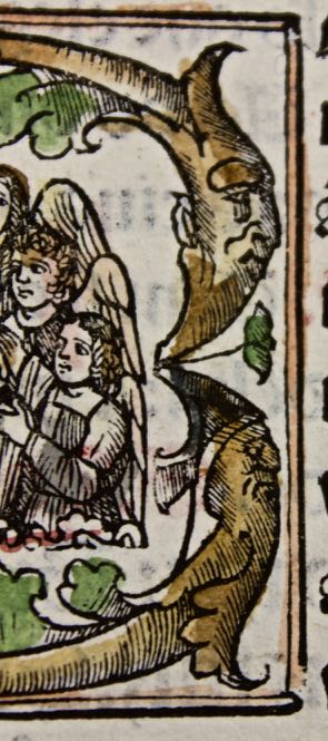 Missal leaf with comical faces in woodcut initials. c.1525. - Click Image to Close